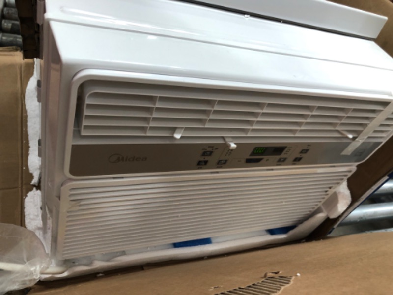 Photo 1 of MIDEA MAW12R1BWT 12,000 BTU EasyCool Window Air Conditioner, Fan-Cools, Circulates, and Dehumidifies Up to 550 Square Feet, Has A Reusable Filter, and Includes an LCD Remote Control
