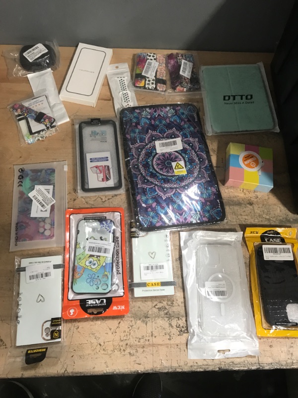 Photo 1 of Assorted IPhone Bundle, Samsung/Android, IPhone 13/12 max and pro, IPad Mini 6th Gen, Watch accessories and Mouse Pad 
