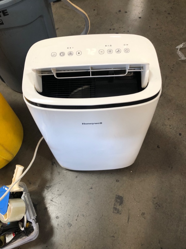 Photo 1 of 12,000 BTU Honeywell Portable Air Conditioner with Dehumidifier & Fan Cools Rooms Up To 550 Sq. Ft. with Remote Control, HJ2CESWK8 (Black/White) 
