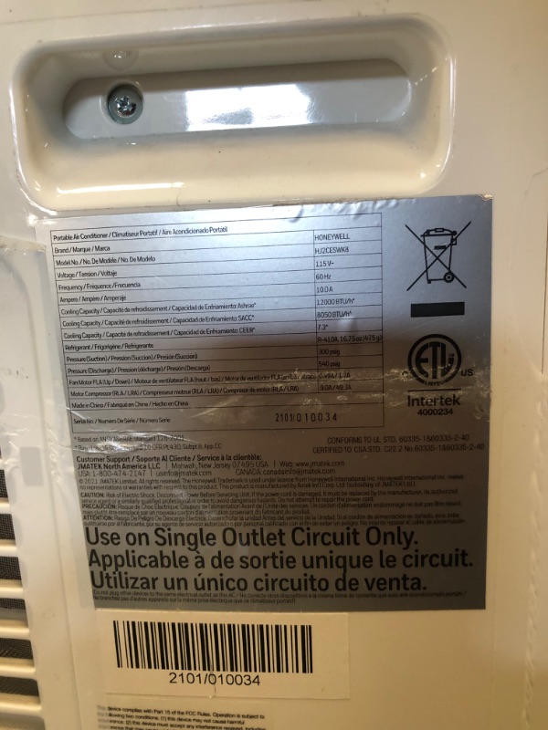 Photo 1 of 12,000 BTU Honeywell Portable Air Conditioner with Dehumidifier & Fan Cools Rooms Up To 550 Sq. Ft. with Remote Control, HJ2CESWK8 (Black/White) 
