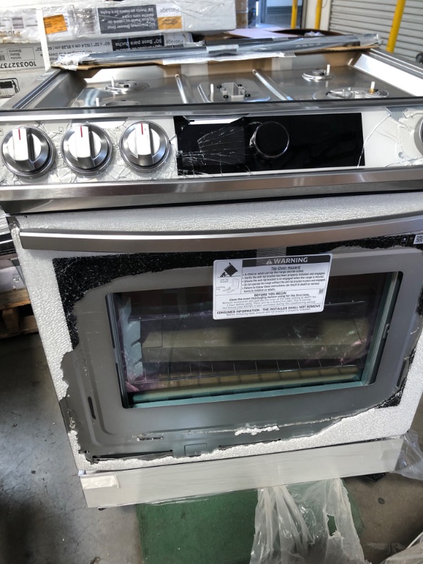 Photo 12 of *** MAJOR DAMAGE*** BROKEN GLASS*** SCRATCHES AND DENTS*** BACK COVERING IS LIFTED ON CORNER***
Samsung
30 in. 6 cu. ft. Slide-In Gas Range with Smart Dial and Air Fry in Fingerprint Resistant Stainless Steel