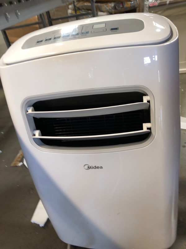 Photo 8 of **PARTS ONLY**

Midea 10,000 BTU ASHRAE (5,800 BTU SACC) Portable Air Conditioner, Cools up to 200 Sq. Ft., Works as Dehumidifier & Fan, Control with Remote, Amazon Alexa & Google Assistant
