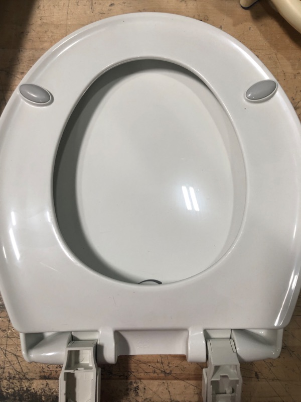 Photo 3 of 
BEMIS
Affinity Soft Close Round Closed Front Plastic Toilet Seat in White Never Loosens and Free Installation Tool