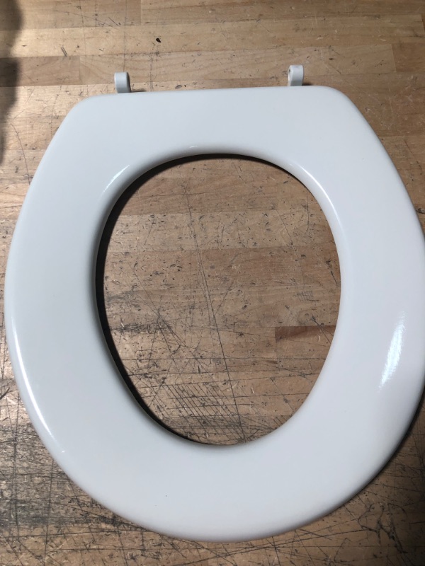 Photo 3 of 
Glacier Bay
Round Closed Front Enameled Wood Toilet Seat in White Removes for Easy Cleaning