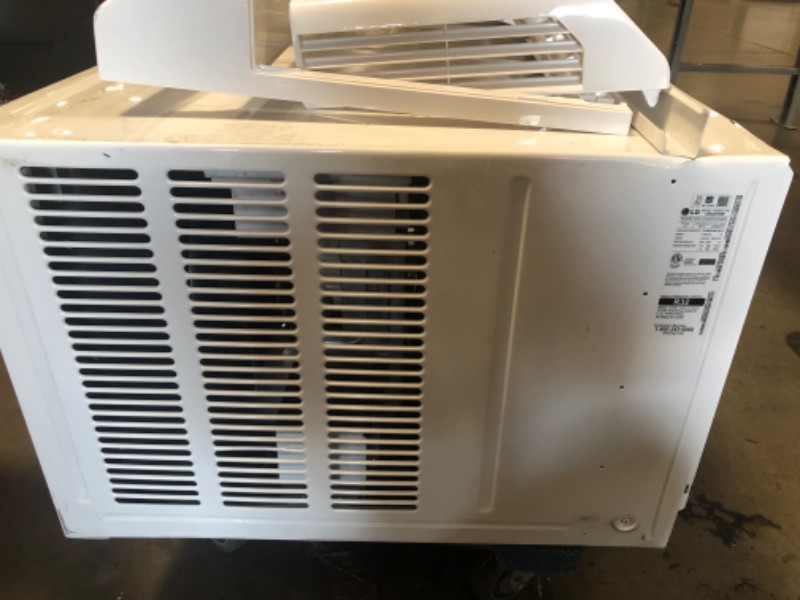Photo 1 of **MAKES NOISE**

LG Electronics 23,500 BTU Dual Inverter Smart Window Air Conditioner Cools 1,440 Sq. Ft. *Plug Type
Requires a 230-volt electrical outlet* 