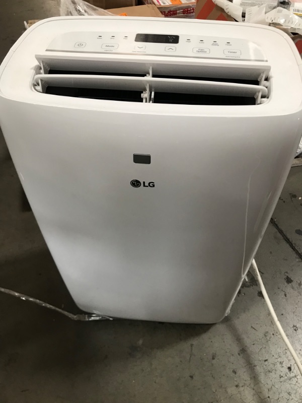 Photo 2 of 7,000 BTU (DOE) 115-Volt Portable Air Conditioner LP0721WSR Cools 300 Sq. Ft. with Dehumidifier Function and LCD Remote
