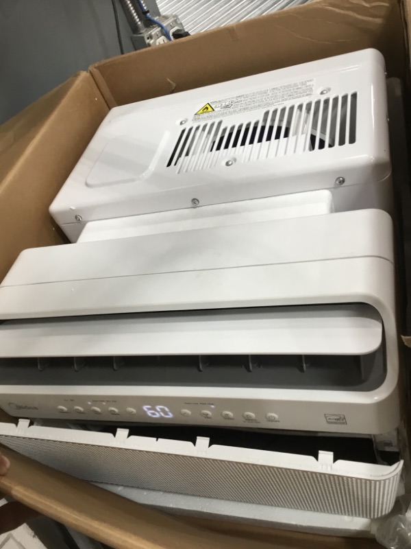 Photo 2 of **PARTS ONLY***
'
Midea 8 000 BTU Smart Inverter U-Shaped Window Air Conditioner 35% Energy Savings Extreme Quiet MAW08V1QWT
