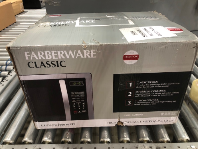 Photo 3 of Farberware Classic FMO07AHTBKJ 0.7 Cu. Ft. 700-Watt Microwave Oven with LED Lighting, Brushed Stainless Steel
