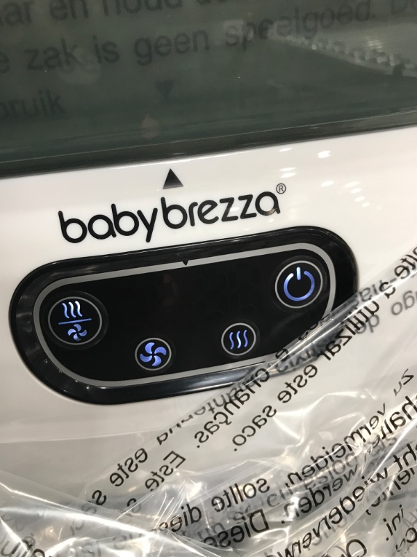 Photo 2 of Baby Brezza Bottle Sterilizer and Dryer Advanced – HEPA Filter And Steam Sterilization – Dries 33 Percent Faster Then Original - Universal Fit up to 8 Baby Bottles And 2 Sets of Pump Parts (Any Brand)
