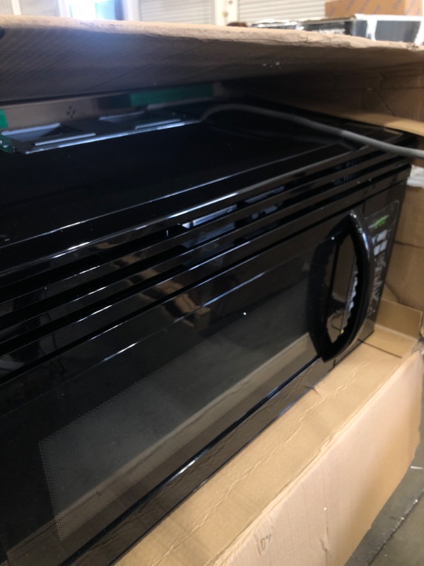 Photo 1 of Black Plus Decker EM044KIN-P 1.6 Cu. Ft. Over-the-Range Microwave Oven with Top Mount Air Recirculation Vent; Stainless Steel (209285)
