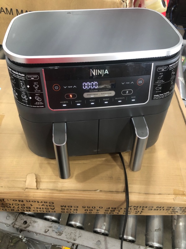 Photo 2 of Ninja DZ201 Foodi 8 Quart 6-in-1 DualZone 2-Basket Air Fryer with 2 Independent Frying Baskets, Match Cook & Smart Finish to Roast, Broil, Dehydrate & More for Quick, Easy Meals, Grey
