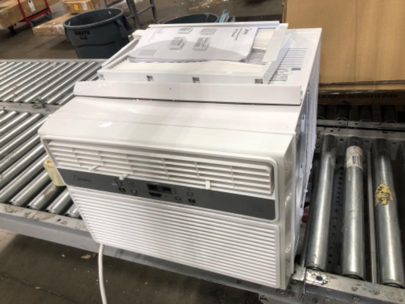 Photo 3 of TESTED POWERS ON**
Midea 12,000 BTU EasyCool Window Air Conditioner, Dehumidifier and Fan - Cool, Circulate and Dehumidify up to 550 Sq. Ft., Reusable Filter, Remote Control
