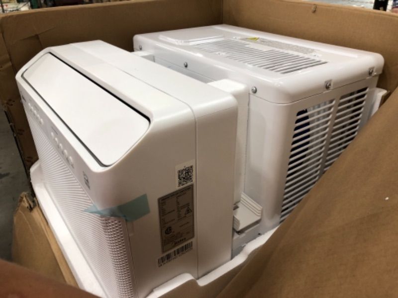 Photo 1 of Midea 8,000 BTU U-Shaped Smart Inverter Window Air Conditioner–Cools up to 350 Sq. Ft., Ultra Quiet with Open Window Flexibility, Works with Alexa/Google Assistant, 35% Energy Savings, Remote Control

