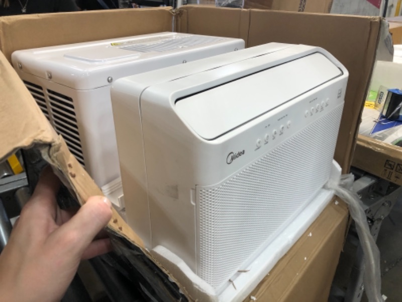 Photo 7 of USED: Midea 8,000 BTU U-Shaped Smart Inverter Window Air Conditioner–Cools up to 350 Sq. Ft., Ultra Quiet with Open Window Flexibility, Works with Alexa/Google Assistant, 35% Energy Savings, Remote Control 19.17 x 21.97 x 13.46 inches

 