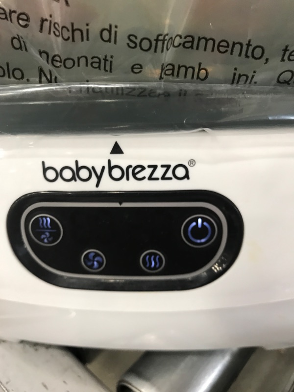 Photo 3 of Baby Brezza Baby Bottle Sterilizer and Dryer Advanced – Electric Steam Sterilization Machine – Universal Sterilizing for All Bottles: Plastic + Glass + Pacifiers + Breast Pump Parts - HEPA Filtration
**USED**