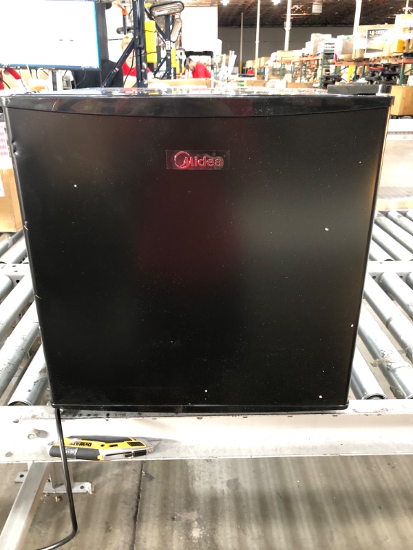 Photo 1 of Midea WHS-65LB1 Compact Single Reversible Door Refrigerator and Freezer, 1.6 Cubic Feet, Black

