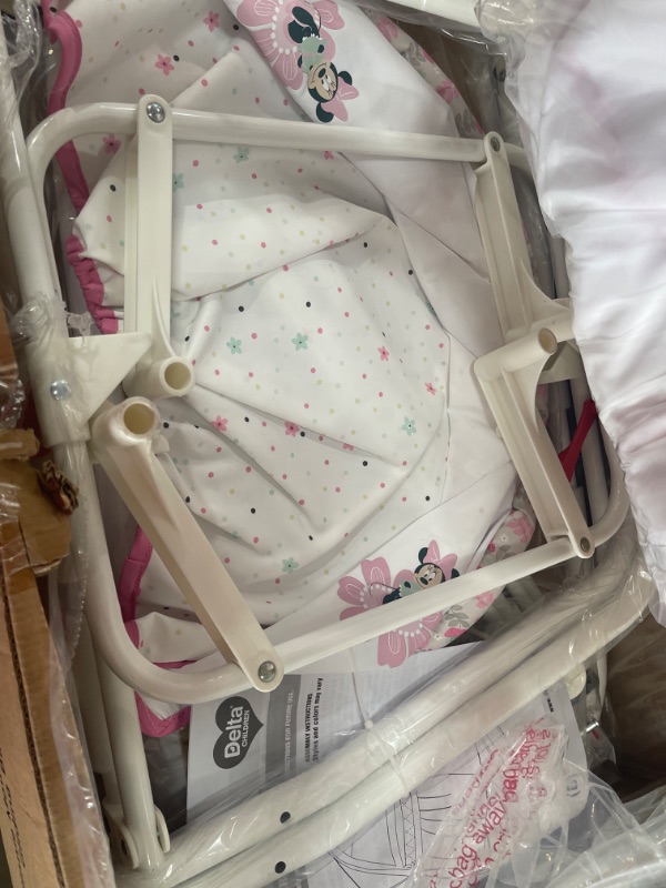 Photo 3 of Delta Children Gliding Bedside Bassinet - Portable Crib with Lights, Sounds and Vibration, Disney Minnie Mouse Boutique
