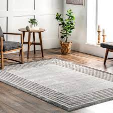 Photo 1 of Anya Washable Bordered Area Rug 6'7"X9'
