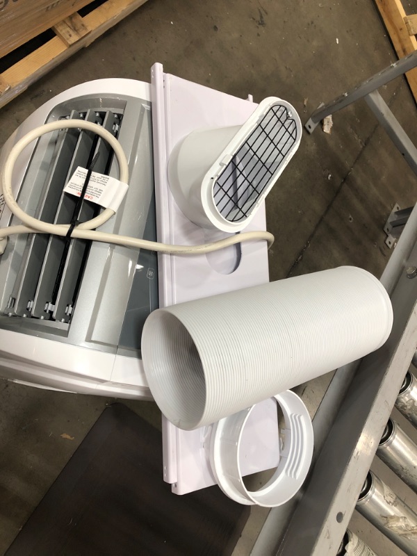 Photo 1 of BLACK+DECKER 14,000 BTU Portable Air Conditioner with Heat and Remote Control, White
