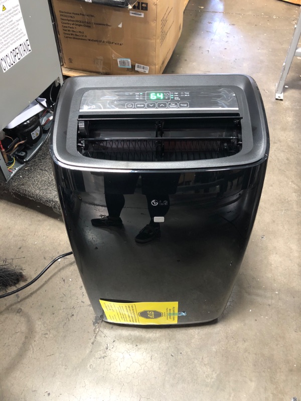 Photo 2 of LG 10,000 BTU (DOE) / 14,000 BTU (ASHRAE) Smart Portable Air Conditioner, Cools 450 Sq.Ft. (18' x 25' room size), Smartphone & Voice Control works with LG ThinQ, Amazon Alexa and Hey Google, 115V
