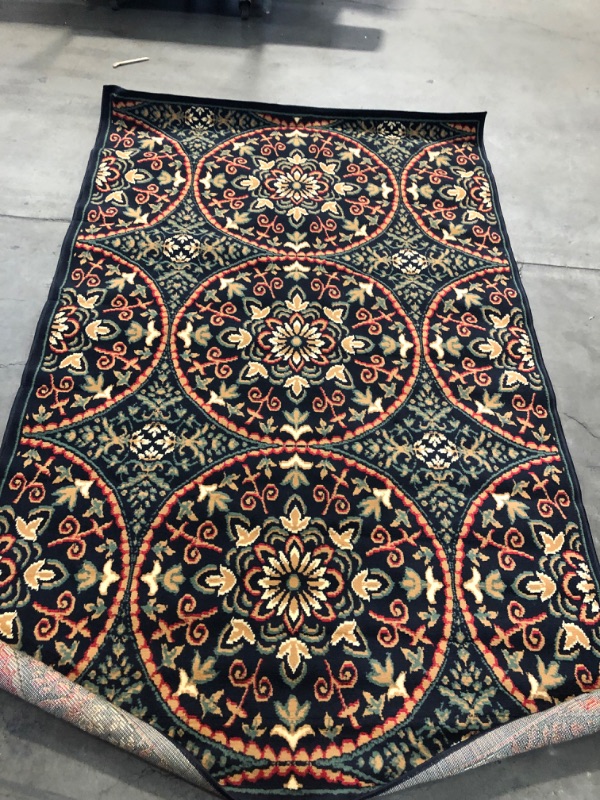 Photo 1 of 8' X 5' AREA RUG 