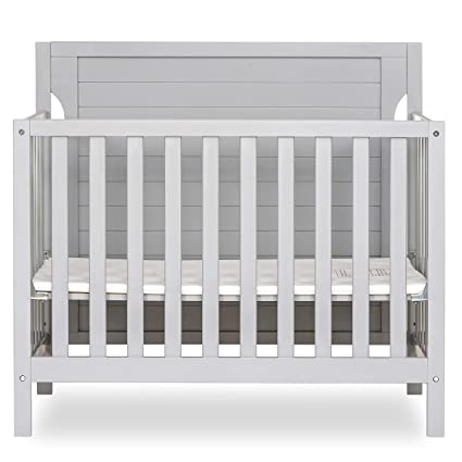 Photo 1 of Dream On Me Bellport 4 in 1 Convertible Mini/Portable Crib I Mini Baby Crib I Includes 1.5 Mattress, Pebble Grey
