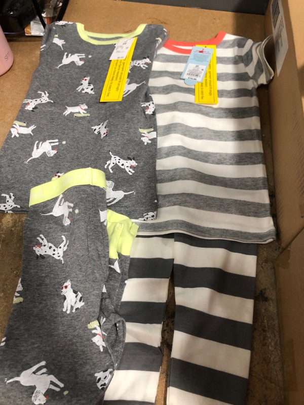 Photo 2 of little boys size: 3t, qty: 12
Toddler Boys' 4pc Puppies Striped Snug Fit Pajama Set - Cat & Jack™
