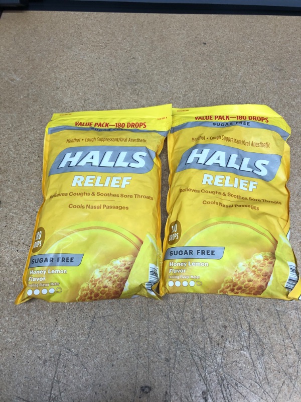 Photo 2 of *EXPIRES June 2022*
HALLS Relief Honey Lemon Sugar Free Cough Drops, Value Pack, 180 Drops (2 bags)
