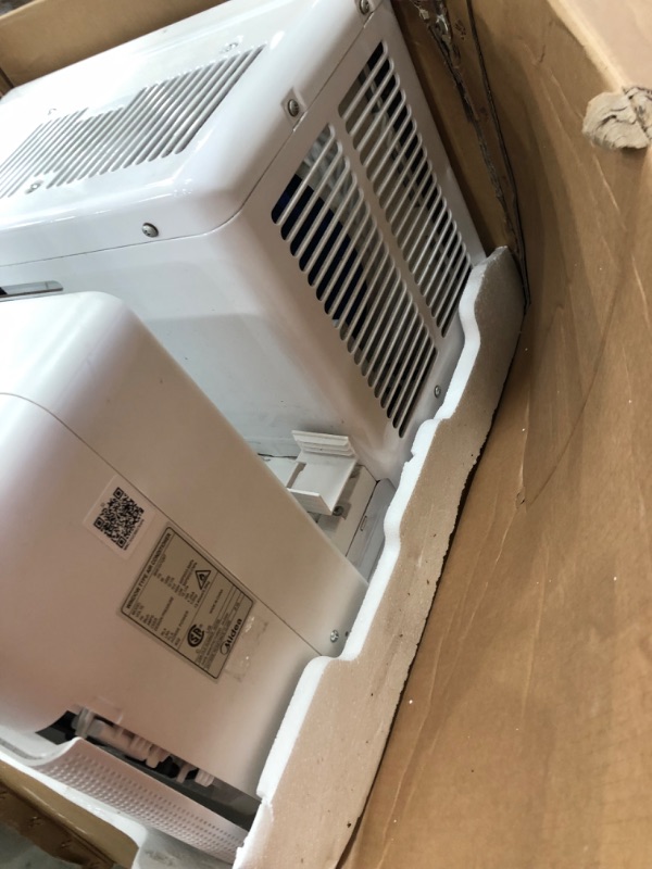 Photo 6 of **PARTS ONLY**
Midea 12,000 BTU U-Shaped Smart Inverter Window Air Conditioner–Cools up to 550 Sq. Ft., Ultra Quiet with Open Window Flexibility, Works with Alexa/Google Assistant, 35% Energy Savings, Remote Control
