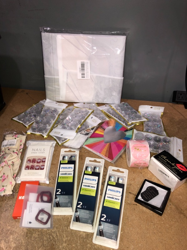 Photo 1 of *bundle of mixed items-nails, glitter for nails, homemade stickers, thankyou business cards, toothbrush, watch accessories, headband, and more.