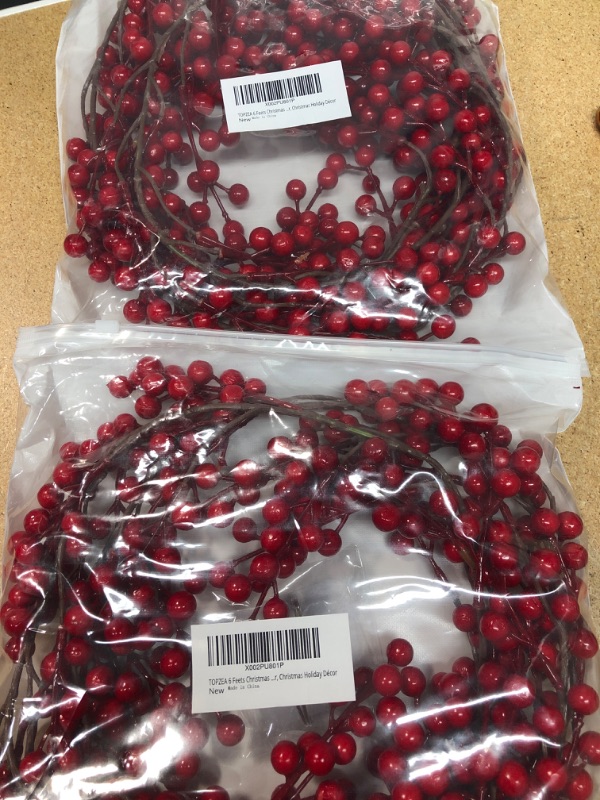 Photo 2 of 2- TOPZEA 6 Feets Christmas Red Berry Garland, Artificial Flexible Burgundy Red Pip Berry Garland for Fireplace, Home, Indoor and Outdoor, Christmas Holiday Décor