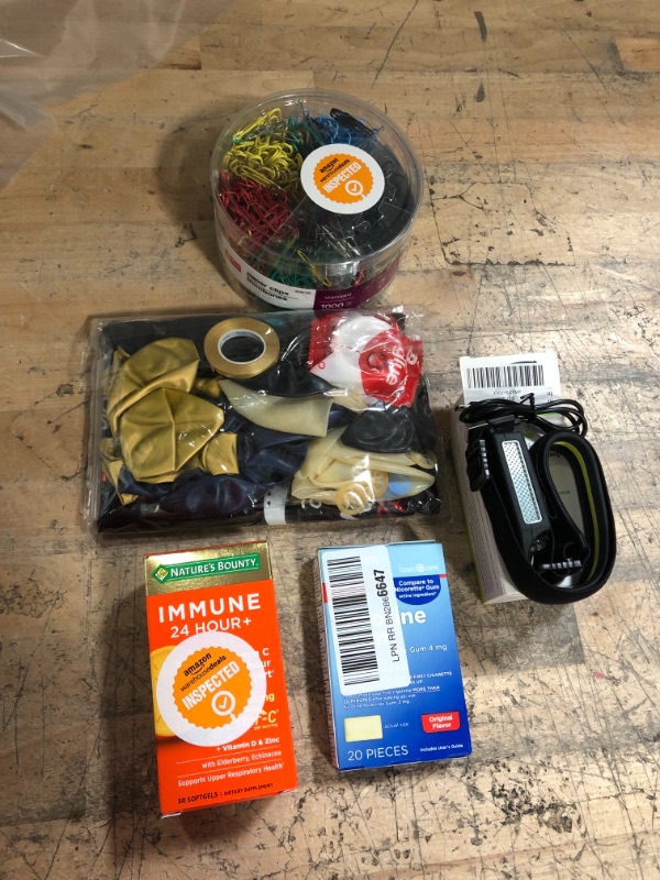 Photo 1 of *EXPIRES Oct 2022 and Aug 2023*
Miscellaneous Bundle (2 in 1 headlamp, father's day banner w/ balloons, 1000 ct paperclips, 50 ct immune supplements, and 20 ct nicotine gum) 
