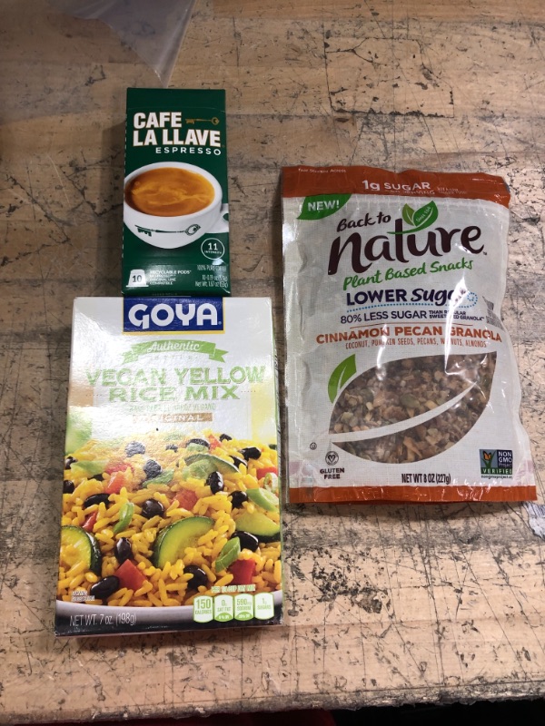 Photo 1 of *EXPIRES Aug 2022 and Nov 2023*
Food / Beverage Bundle (8oz granola, 10 ct espresso capsules and vegan yellow rice)