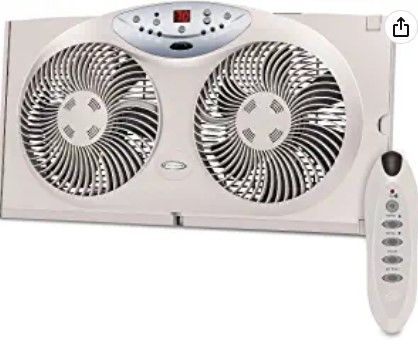 Photo 1 of Bionaire Window Fan with Twin 8.5-Inch Reversible Airflow Blades and Remote Control, White