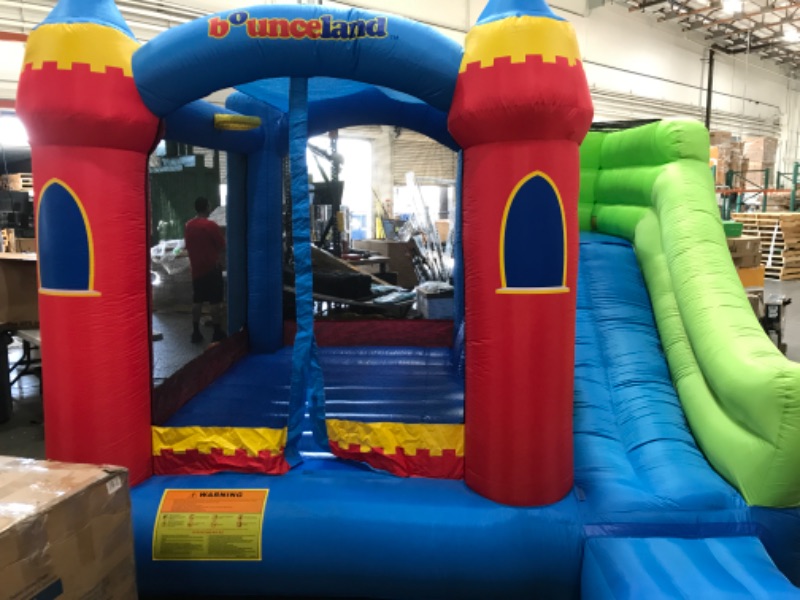 Photo 5 of Bounceland Royal Palace Inflatable Bounce House, with Long Slide, Large Bouncing Area, Basketball Hoop and Sun Roof, 13 ft x 12 ft x 9 ft H, UL Strong Certified Blower, Castle Kids Party Theme
