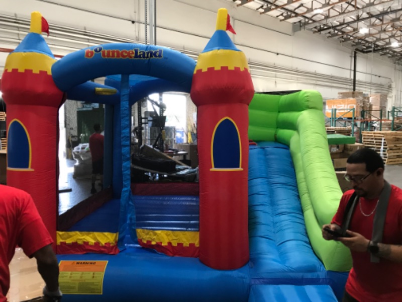 Photo 2 of Bounceland Royal Palace Inflatable Bounce House, with Long Slide, Large Bouncing Area, Basketball Hoop and Sun Roof, 13 ft x 12 ft x 9 ft H, UL Strong Certified Blower, Castle Kids Party Theme
