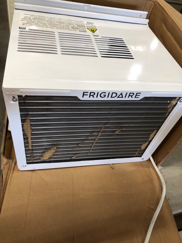 Photo 3 of **MINOR DAMAGE** FRIGIDAIRE 12,000 BTU 115V Window-Mounted Compact Air Conditioner with Remote Control, White
