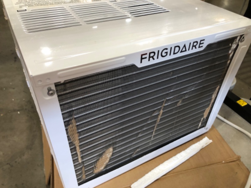 Photo 4 of **MINOR DAMAGE** FRIGIDAIRE 12,000 BTU 115V Window-Mounted Compact Air Conditioner with Remote Control, White
