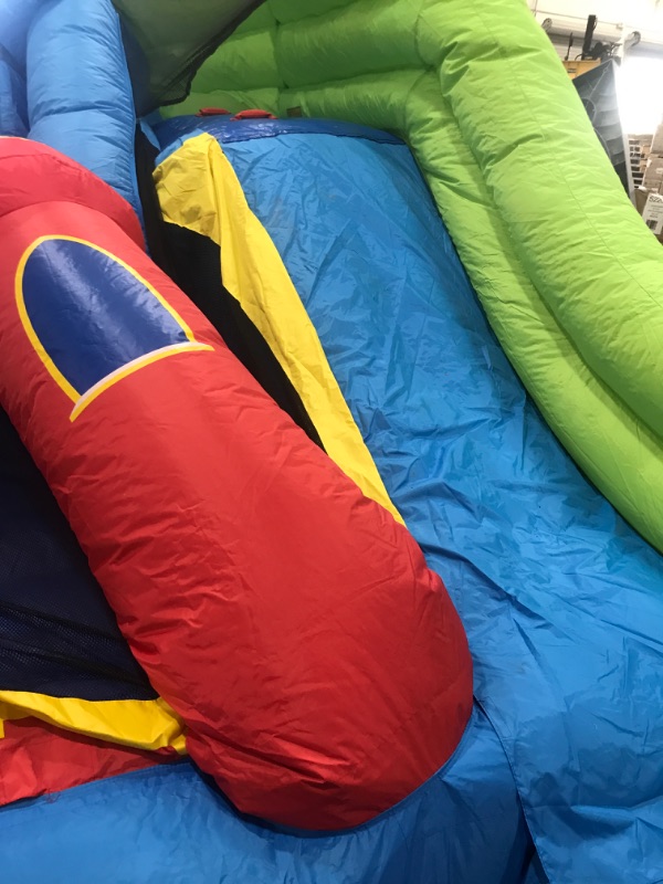 Photo 6 of **MINOR DAMAGE SMALL TEAR* Bounceland Royal Palace Inflatable Bounce House, with Long Slide, Large Bouncing Area, Basketball Hoop and Sun Roof, 13 ft x 12 ft x 9 ft H, UL Strong...
