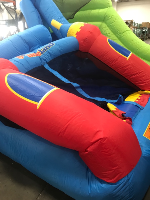 Photo 1 of **MINOR DAMAGE SMALL TEAR* Bounceland Royal Palace Inflatable Bounce House, with Long Slide, Large Bouncing Area, Basketball Hoop and Sun Roof, 13 ft x 12 ft x 9 ft H, UL Strong...
