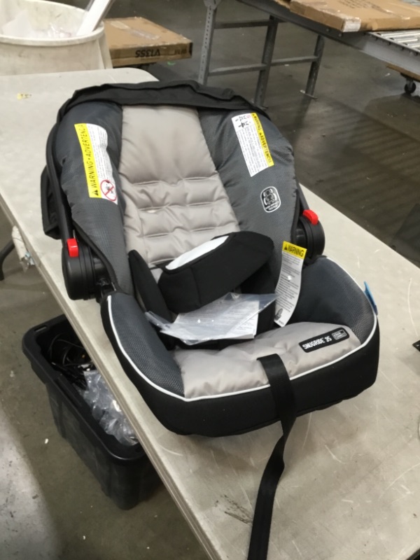 Photo 2 of Graco FastAction Fold Jogger Travel System | Includes the FastAction Fold Jogging Stroller and SnugRide 35 Infant Car Seat, Gotham
