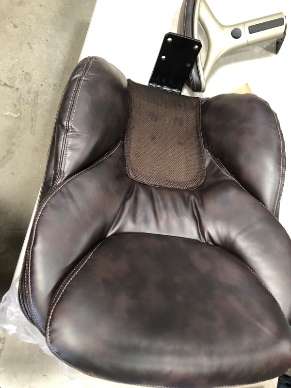 Photo 2 of **MISSING HARDWARE* Serta Ergonomic Executive Office Chair Motion Technology Adjustable Mid Back Design with Lumbar Support, Chestnut Bonded Leather
