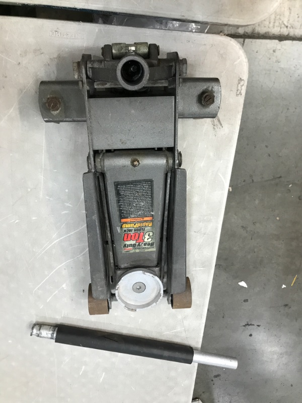 Photo 2 of **Rusted** WOLF Low Profile Economic Aluminum Service/Floor Garage Jack with Quick Lift Pump, 3 Ton (6,000 Lb) Capacity, Black (WFT830003XLB)
