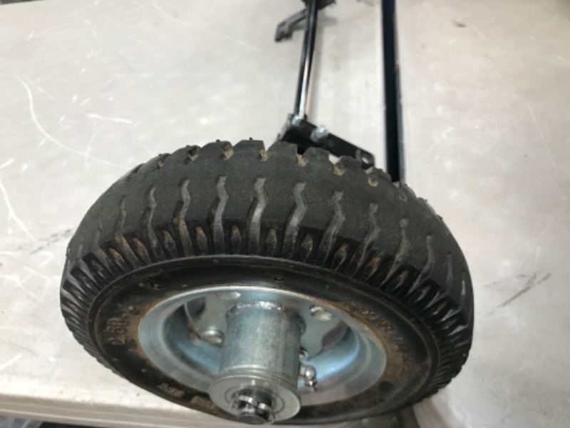 Photo 2 of **WOBBLE TO ONE TIRE** Hardline Products 1602-UT-H Wheels-4-Tots Universal Training Wheel , Black
