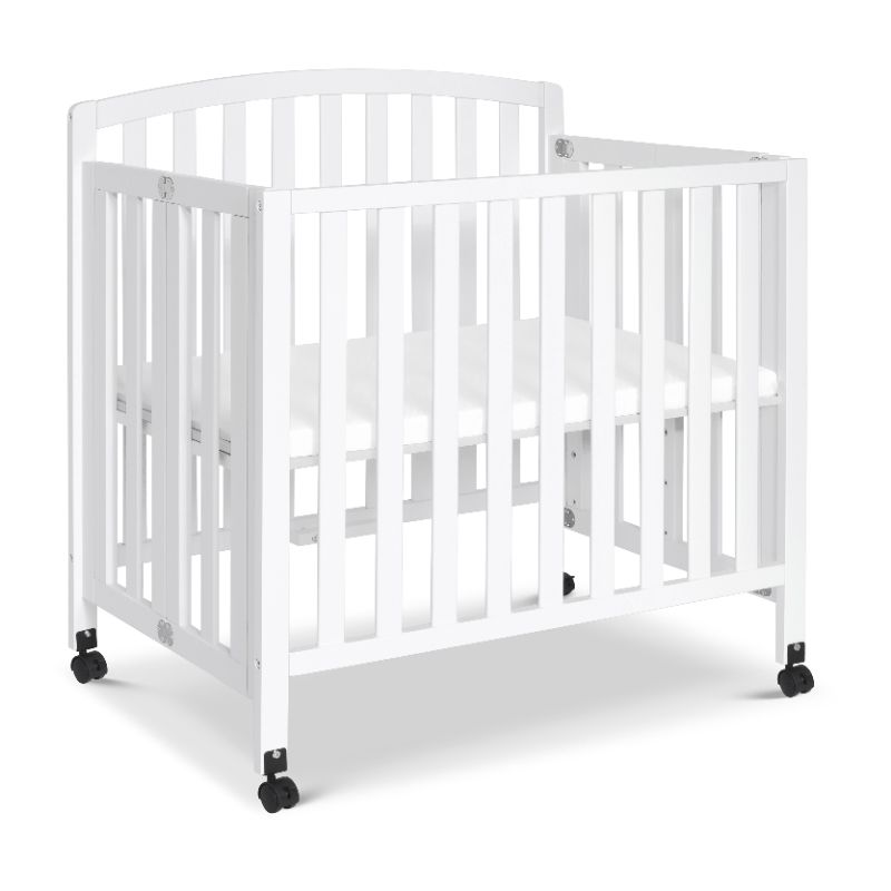 Photo 1 of Davinci Dylan Folding Portable 3-in-1 Mini Crib in White
