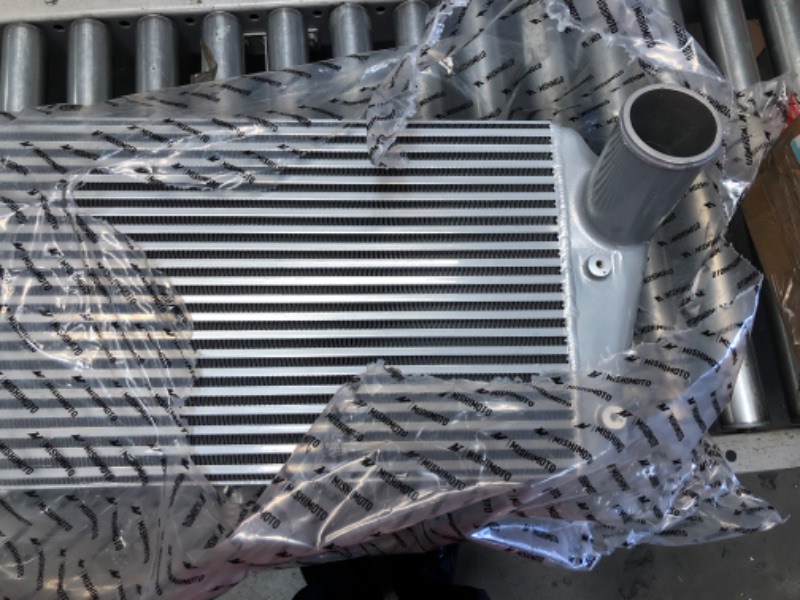 Photo 2 of ***PARTS ONLY*** INTERCOOLER KIT, FITS DODGE RAM 6.7L CUMMINS 2013–2018 - INCOMPLETE SET*** 
BOX 1 OF 2 - MISSING KIT SET AND HARDWARE - INTERCOOLER ONLY***
