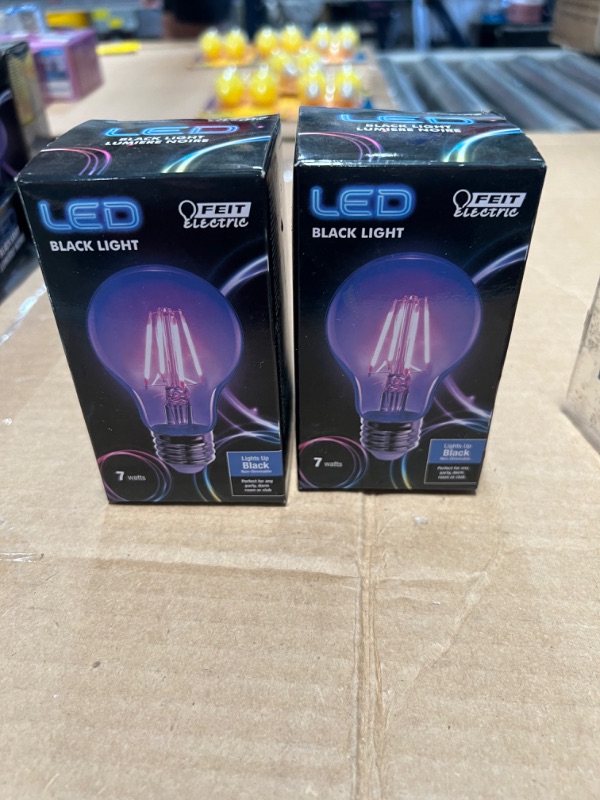 Photo 2 of 2pcks of Feit Electric A19/BLB/LED 7 Watt Non-Dimmable Filament Glass A19 LED Light Bulb, Black Light for Party, Stage, Special Effects, Halloween
