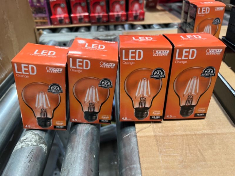 Photo 2 of 4pcks of Feit Electric A19/TO/LED Filament 25W Equivalent Dimmable Clear Glass Light Bulb, Orange
