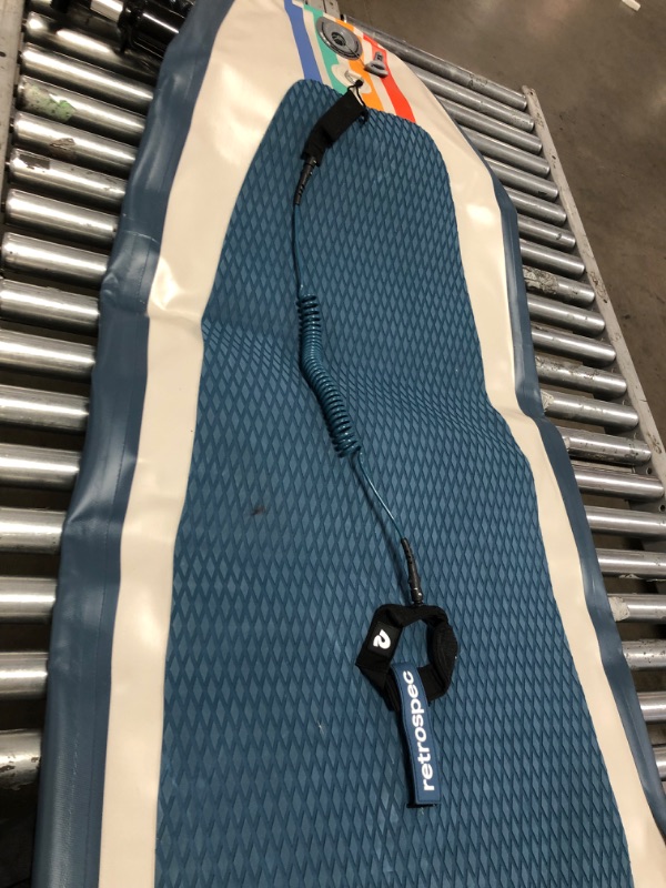 Photo 2 of Retrospec Weekender 10' Inflatable Stand Up Paddleboard ISUP Bundle with Carrying Case, 3 Piece Adjustable Aluminum Paddle, 3 Removable Fins, Pump, and Cell Phone Case
**used** minor cosmetic damage***