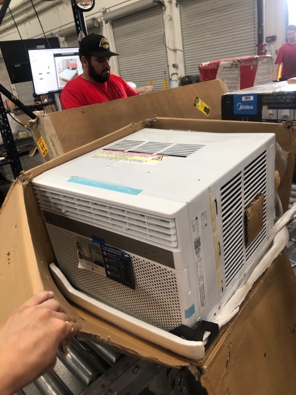 Photo 2 of **PARTS ONLY**

AHEK10AC 19" Smart Window Air Conditioner with 10000 BTU Cooling Capacity Energy Star Qualified Wifi Connect and 11.4 CEER in
